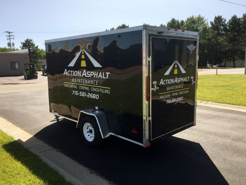 Action Asphalt Trailer Graphics Installation by D&L Signs